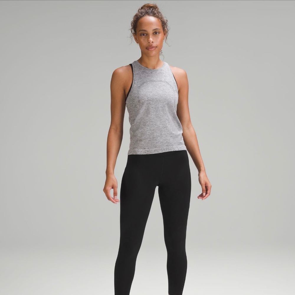 Lululemon Black Fast and Free High Rise pant with pockets, size 6.